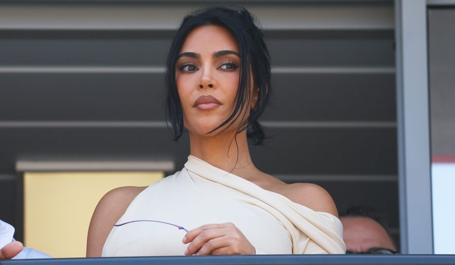 Kim Kardashian attends he Formula One Monaco Grand Prix race at the Monaco racetrack, Sunday, June 7, 2026. (Yves Herman, Pool Photo via AP)