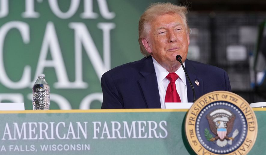 President Donald Trump speaks at Custer Farms in Chippewa Falls, Wis., Friday, June 5, 2026. (AP Photo/Mark Schiefelbein)