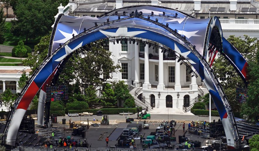 Construction continues on the arena on the South Lawn of the White House for a future UFC mixed martial arts fight, Saturday, June 6, 2026, in Washington. (AP Photo/John McDonnell)