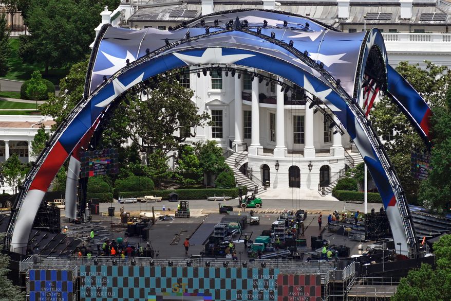 Construction continues on the arena on the South Lawn of the White House for a future UFC mixed martial arts fight, Saturday, June 6, 2026, in Washington. (AP Photo/John McDonnell)