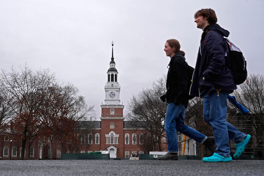 Students cross the campus of Dartmouth College in Hanover, N.H., on March 5, 2024. (AP Photo/Robert F. Bukaty) **FILE**