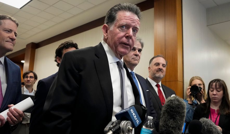 Attorney Dan Cogdell addresses reporters, March 26, 2024, at Harris County Criminal Courts at Law in Houston. (Yi-Chin Lee/Houston Chronicle via AP, file)