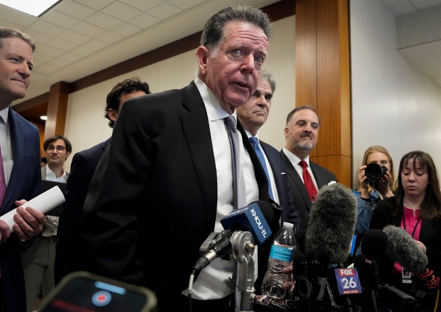 Attorney Dan Cogdell addresses reporters, March 26, 2024, at Harris County Criminal Courts at Law in Houston. (Yi-Chin Lee/Houston Chronicle via AP, file)