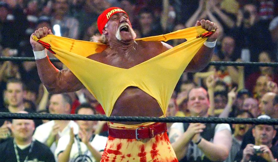 Famed wrestler Hulk Hogan fires up the crowd between matches during WrestleMania 21 in Los Angeles, April 3, 2005. (AP Photo/Chris Carlson, File)