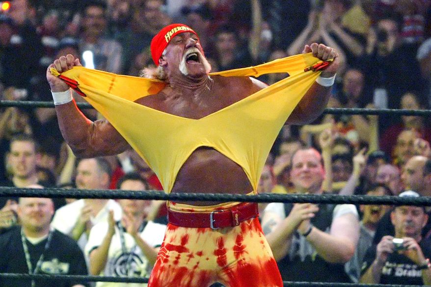 Famed wrestler Hulk Hogan fires up the crowd between matches during WrestleMania 21 in Los Angeles, April 3, 2005. (AP Photo/Chris Carlson, File)