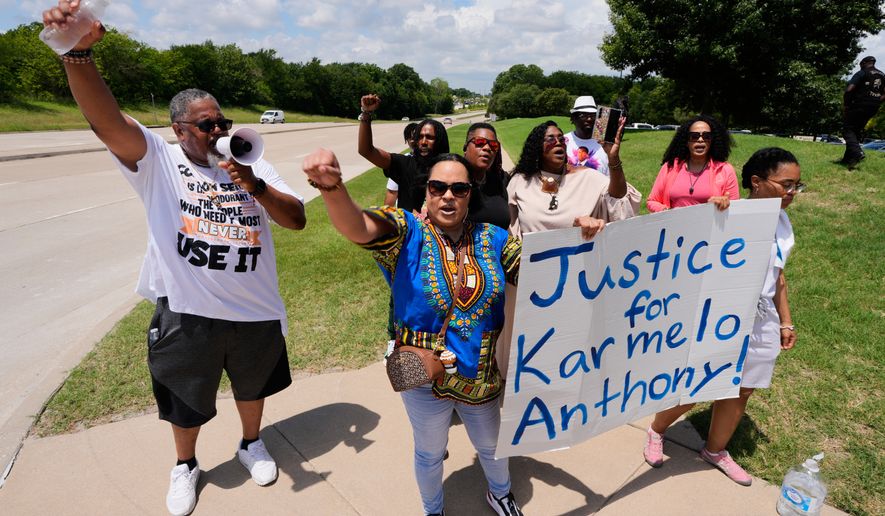 Supporters for Karmelo Anthony demonstrate in front of the Collin County courthouse Thursday, June 4, 2026, in McKinney, Texas. (AP Photo/Tony Gutierrez)
