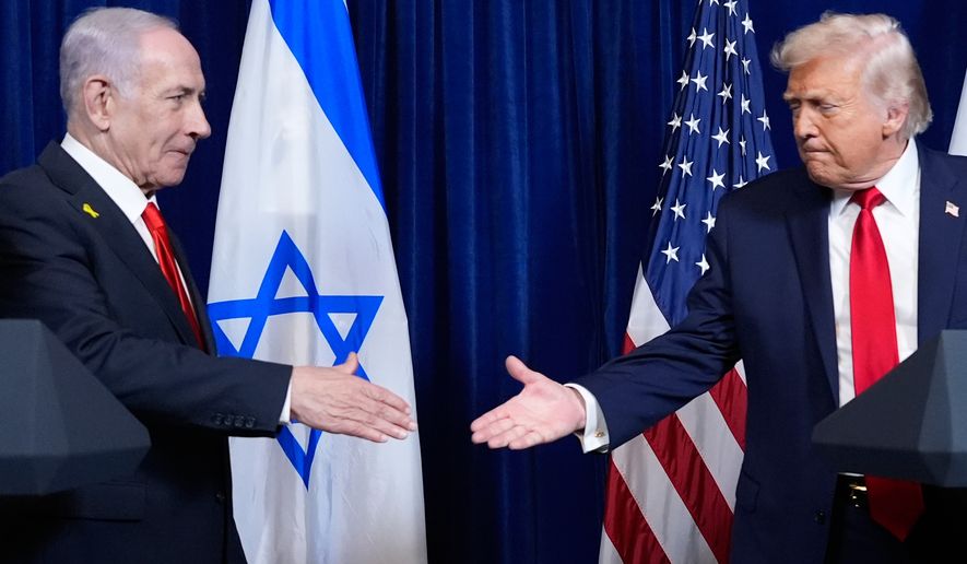 President Donald Trump shakes hands with Israel's Prime Minister Benjamin Netanyahu at the end of a news conference at Mar-a-Lago, Dec. 29, 2025, in Palm Beach, Fla. (AP Photo/Alex Brandon, File)