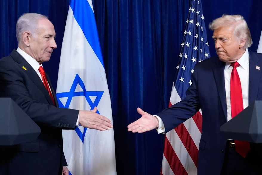 President Donald Trump shakes hands with Israel's Prime Minister Benjamin Netanyahu at the end of a news conference at Mar-a-Lago, Dec. 29, 2025, in Palm Beach, Fla. (AP Photo/Alex Brandon, File)