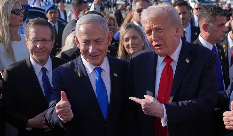 President Donald Trump poses for a photo with Israel's Prime Minister Benjamin Netanyahu before he boards Air Force One at Ben Gurion International Airport, Oct. 13, 2025, near Tel Aviv, as Israel's President Isaac Herzog watches at left. (AP Photo/Evan Vucci, File)