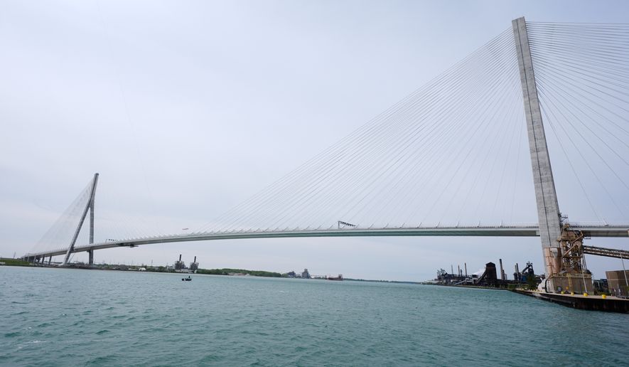 The Gordie Howe Bridge is shown under construction between Windsor, Ontario and Detroit, May 22, 2026. (AP Photo/Paul Sancya, File)