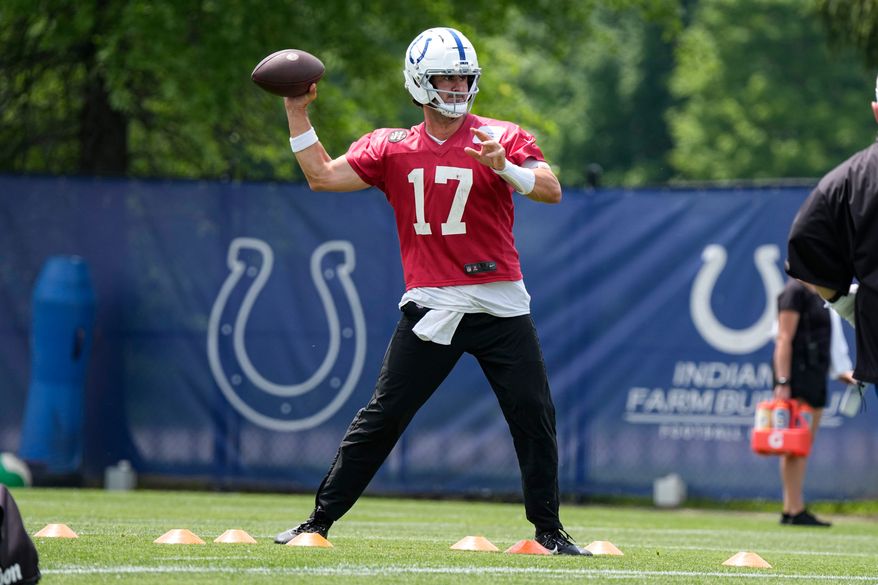 Indianapolis Colts quarterback Daniel Jones (17) throws during the NFL football team's practice in Indianapolis, Tuesday, June 9, 2026. (AP Photo/Michael Conroy)