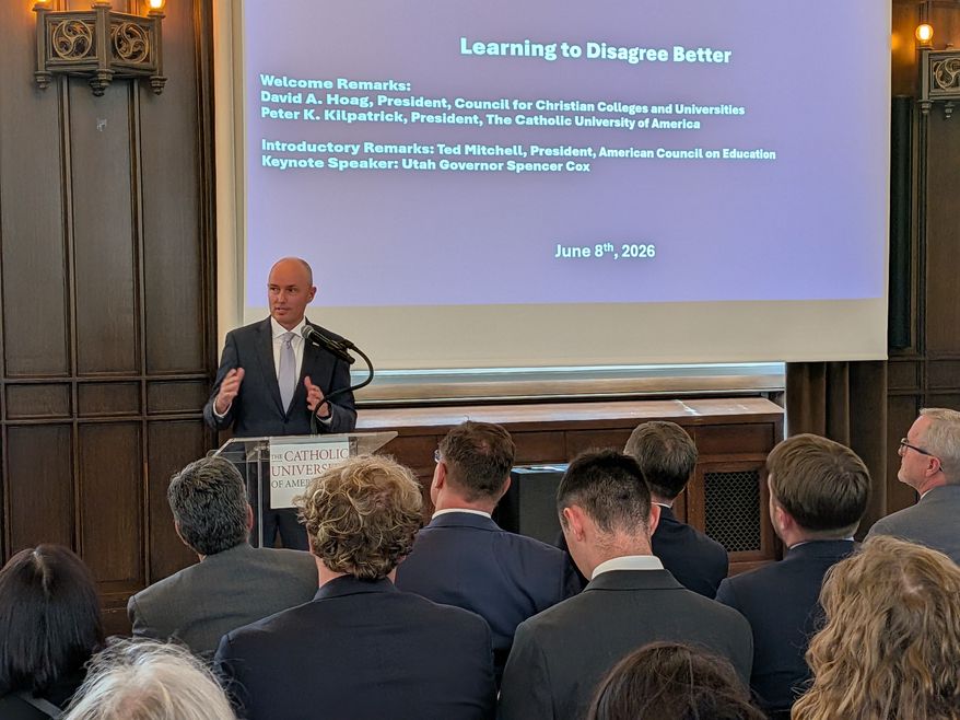 Utah Gov. Spencer Cox, a Republican, addressed a gathering of the nation's Christian and Jewish colleges on Monday, June 8, 2026, at The Catholic University of America. (Sean Salai/The Washington Times)
