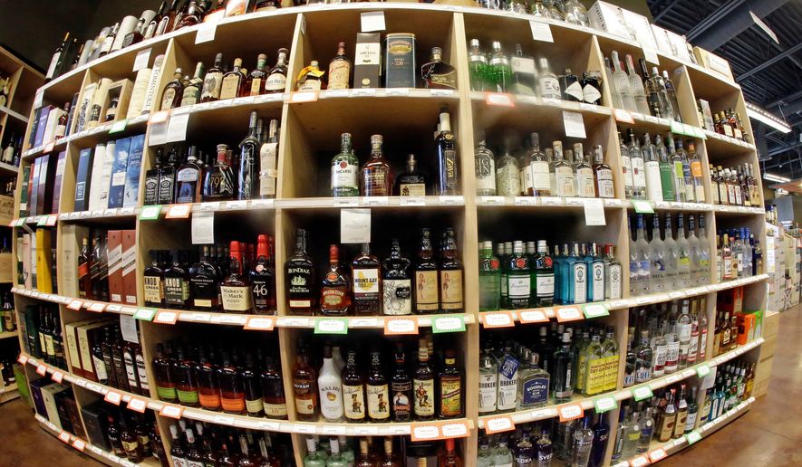 FILE - Bottles of alcohol during a tour of a state liquor store, in Salt Lake City, June 16, 2016. (AP Photo/Rick Bowmer, File)