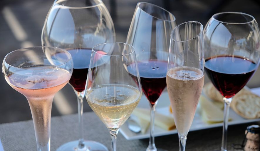 FILE - Various wines are displayed in Sonoma, Calif., July 10, 2017. (AP Photo/Eric Risberg, File)