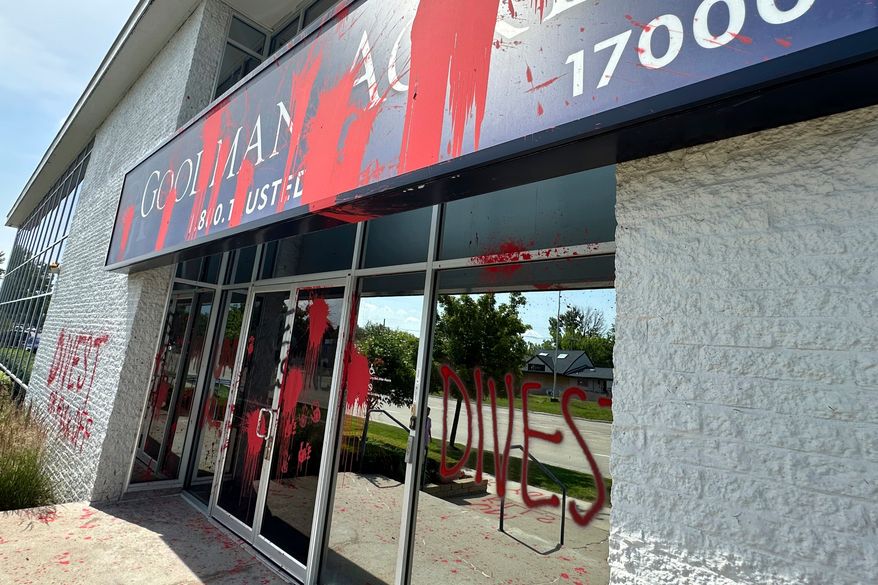 FILE - Pro-Palestinian graffiti mars the outside of the Goodman Acker law offices, June 3, 2024, in Southfield, Mich., just north of Detroit. (AP Photo/Corey Williams, File)