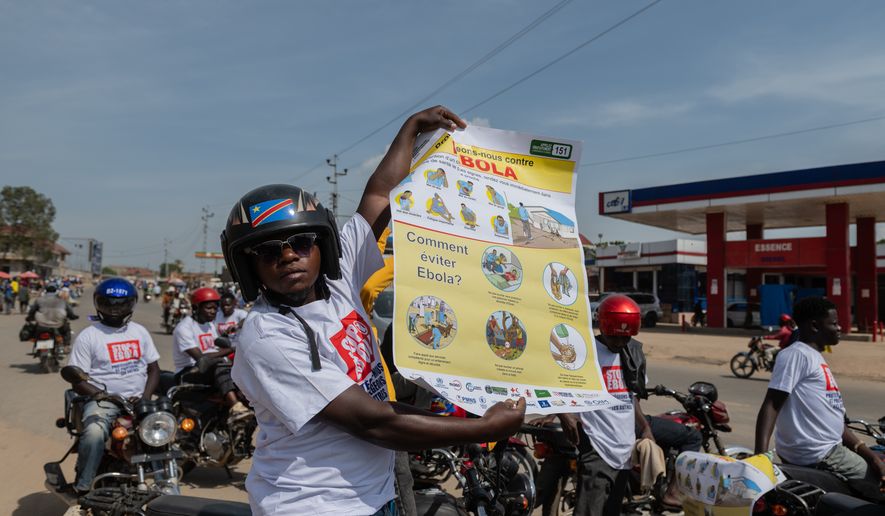 Motorcyclists join an awareness campaign organized by the World Health Organization (WHO) to combat Ebola in Bunia, Congo, Wednesday, June 10, 2026. (AP Photo/Moses Sawasawa)
