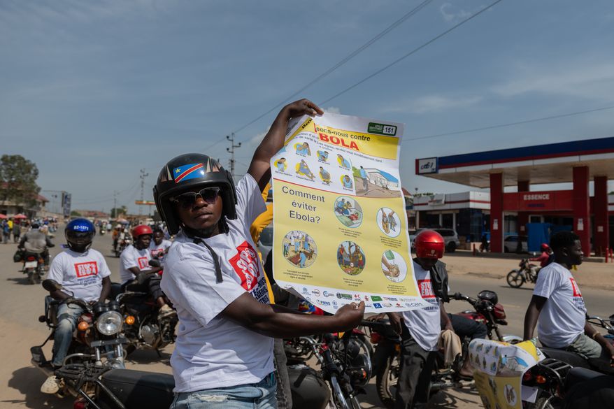 Motorcyclists join an awareness campaign organized by the World Health Organization (WHO) to combat Ebola in Bunia, Congo, Wednesday, June 10, 2026. (AP Photo/Moses Sawasawa)