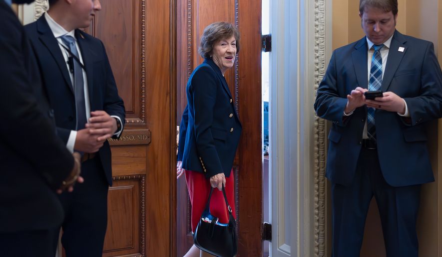 Sen. Susan Collins, R-Maine, chair of the Senate Appropriations Committee, heads to the chamber before votes on the immigration enforcement funding package, at the Capitol in Washington, Thursday, June 4, 2026. (AP Photo/J. Scott Applewhite)