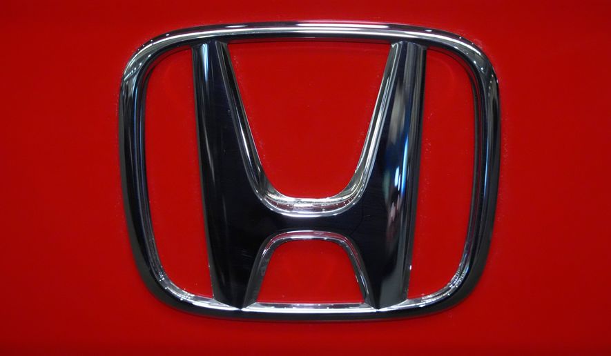 FILE - This is the Honda logo on a Honda Civic Sport Touring automobile on display at the Pittsburgh International Auto Show in Pittsburgh, Feb. 14, 2025. (AP Photo/Gene J. Puskar, file)
