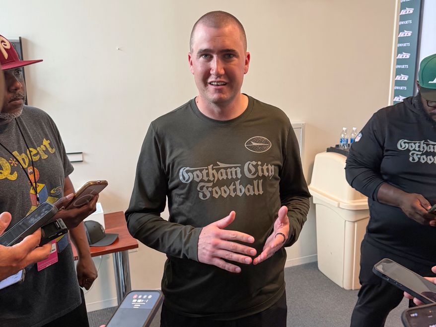 New York Jets' passing game coordinator Seth Ryan talks to reporters after NFL football practice in Florham Park, N.J., Wednesday, June 10, 2026. (AP Photo/Dennis Waszak Jr.)