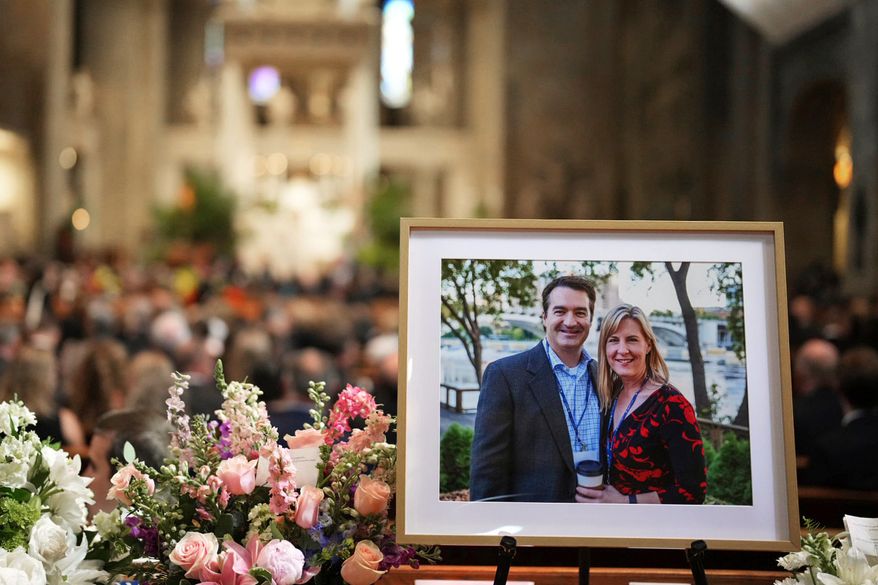FILE - A photo of Mark and Melissa Hortman is displayed during their funeral service inside the sanctuary at the Basilica of St. Mary's in Minneapolis on June 28, 2025. (Alex Kormann/Star Tribune via AP, Pool, File)