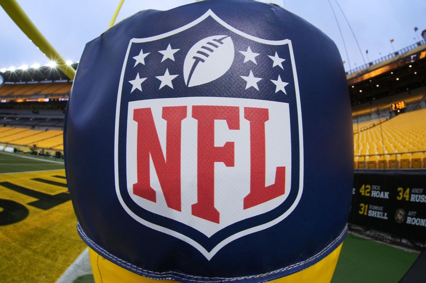 The NFL logo is displayed on a goal post at Acrisure Stadium before an NFL football game between the Pittsburgh Steelers and the Baltimore Ravens in Pittsburgh Jan. 4, 2026. (AP Photo/Gene J. Puskar, File)