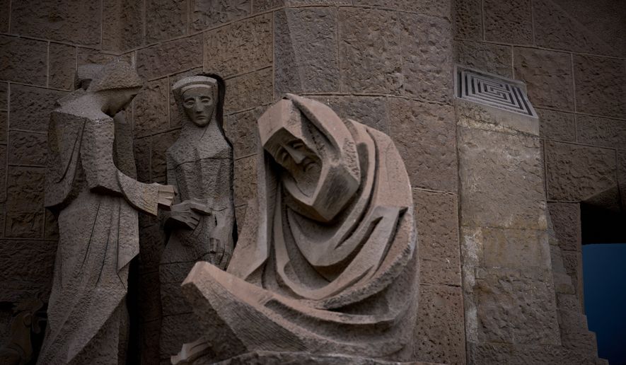 A small square-shaped labyrinth is photographed at the Passion Façade at the basilica's Sagrada Família in Barcelona, Spain, Spain, May 15, 2026. (AP Photo/Emilio Morenatti)