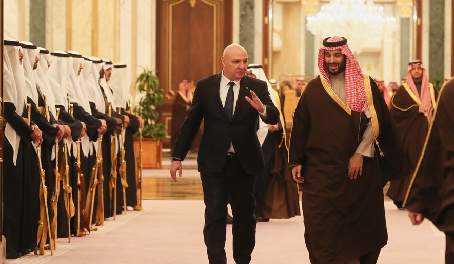 In this photo released by the Lebanese Presidency press office, Saudi Crown Prince Mohammed bin Salman accompanies Lebanese President Joseph Aoun, left, upon his arrival to the Royal Palace in Riyadh, Saudi Arabia, March 3, 2025. (Lebanese Presidency press office via AP, File)