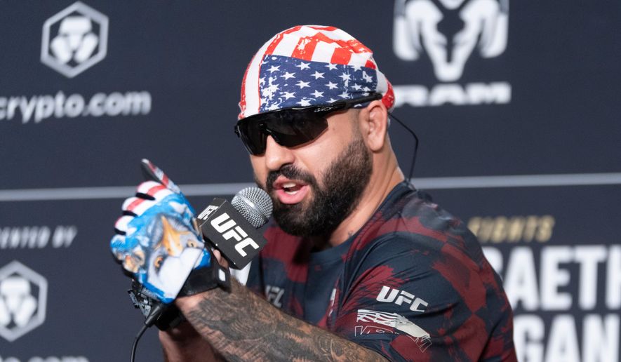 UFC heavyweight fighter Josh Hokit speaks to reporters during the UFC Freedom 250 media day, Wednesday, June 10, 2026, in Washington. (AP Photo/Manuel Balce Ceneta)