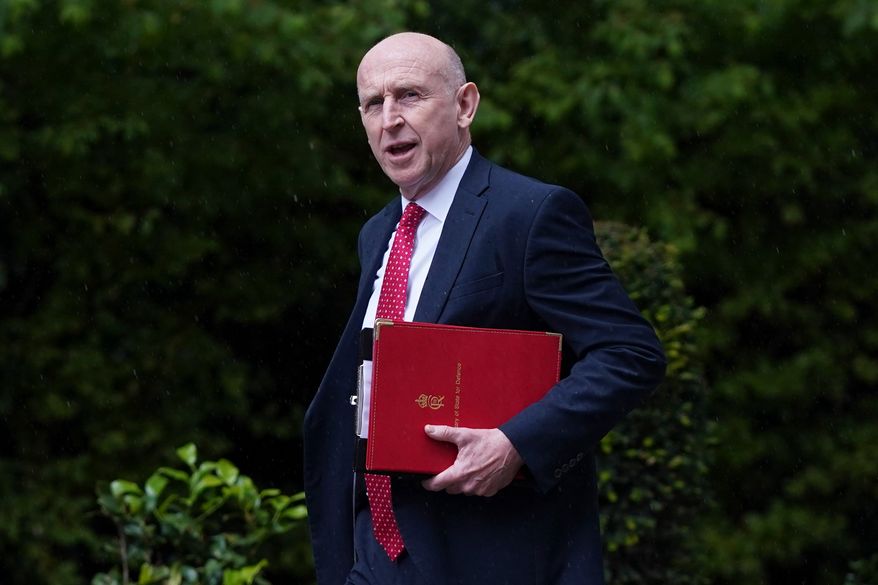 U.K. Defense Secretary John Healey arrives for a Cabinet meeting inside 10 Downing Street in London, Tuesday, June 2, 2026. (AP Photo/Alberto Pezzali)