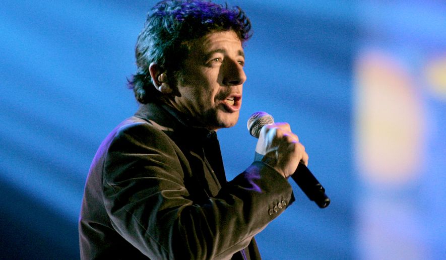 FILE - French singer Patrick Bruel performs during the Victoires de la Musique awards ceremony in Paris on March 10, 2007. (AP Photo/Jacques Brinon, File)