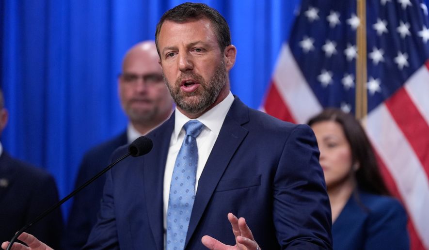 Homeland Security Secretary Markwayne Mullin speaks during a news conference on unaccompanied children at the Justice Department Thursday, June 11, 2026, in Washington. (AP Photo/Manuel Balce Ceneta)