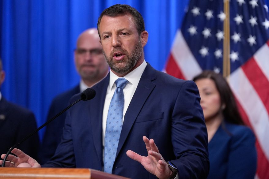 Homeland Security Secretary Markwayne Mullin speaks during a news conference on unaccompanied children at the Justice Department Thursday, June 11, 2026, in Washington. (AP Photo/Manuel Balce Ceneta)