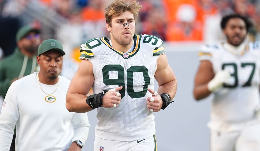 FILE - Green Bay Packers defensive end Lukas van Ness (90) in the second half of an NFL football game, Dec. 14, 2025, in Denver. (AP Photo/David Zalubowski, File)