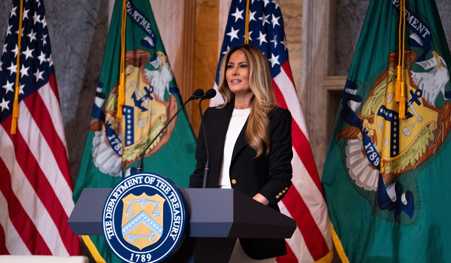 First lady Melania Trump speaks about Trump Accounts for children in foster care at the Department of Treasury, Thursday, June 11, 2026, in Washington. (AP Photo/Allison Robbert)