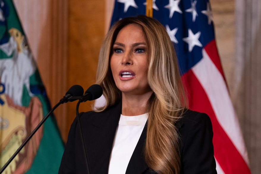 First lady Melania Trump speaks about Trump Accounts for children in foster care at the Department of Treasury, Thursday, June 11, 2026, in Washington. (AP Photo/Allison Robbert)