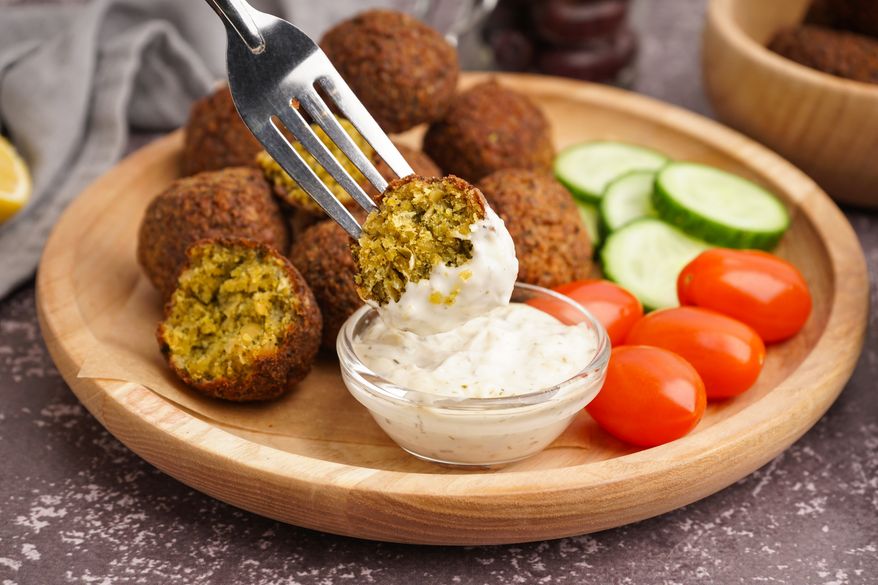 International Falafel Day, observed every June 12, highlights the enduring global appeal of the deep-fried chickpea fritter beloved far beyond its Middle Eastern roots. File photo credit: Pixel-Shot via Shutterstock.
