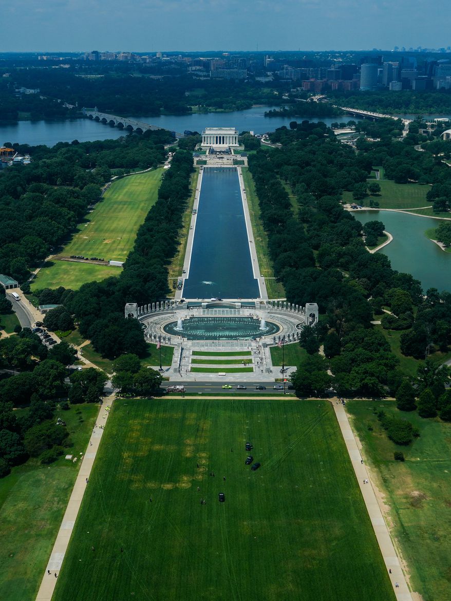 Markings in the grass spelling out 8647 are seen from the Washington Monument, Thursday, June 11, 2026, in Washington. (AP Photo/Julia Demaree Nikhinson)