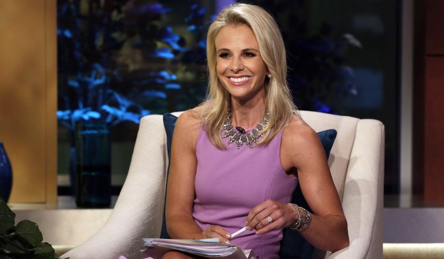 FILE - In this Sept. 16, 2013 file photo, Elisabeth Hasselbeck appears in her debut as the new co-host of the "Fox & Friends" television program in New York. Hasselbeck says she's leaving as one of the three co-hosts on the "Fox & Friends" morning show to spend more time with her three children. Hasselbeck, who was the conservative voice on "The View" before joining Fox News Channel, has worked with co-hosts Steve Doocy and Brian Kilmeade since September 2013. It's the top-rated morning news show on cable. (AP Photo/Richard Drew, File)