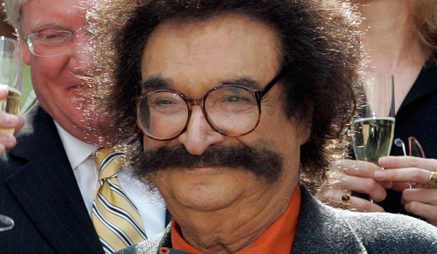In this May 31, 2006 file photo, film critic Gene Shalit is seen during a toast with "Today" show cast and crew at the end of Katie Couric's final show, in New York. (AP Photo/Richard Drew, File)
