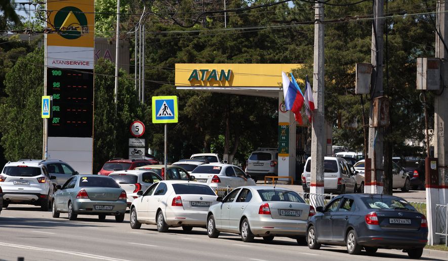 Cars line up at a petrol station in Simferopol, Crimea, Friday, June 12, 2026. (AP Photo)