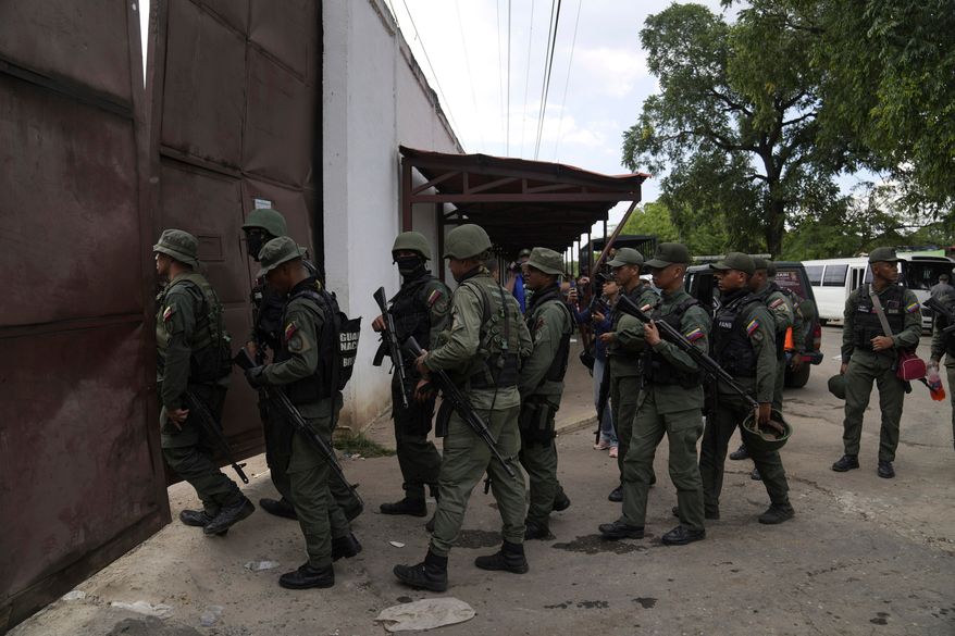 Soldiers raid the Tocorón Penitentiary Center, where the Tren de Aragua gang originated, in Tocorón, Venezuela, Sept. 20, 2023. (AP Photo/Ariana Cubillos, File)