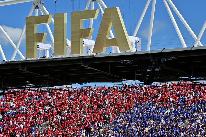 Fans of both teams cheer under a FIFA sign in the stands during the World Cup Group B soccer match between Canada and Bosnia, Friday, June 12, 2026, in Toronto. (Sammy Kogan/The Canadian Press via AP)