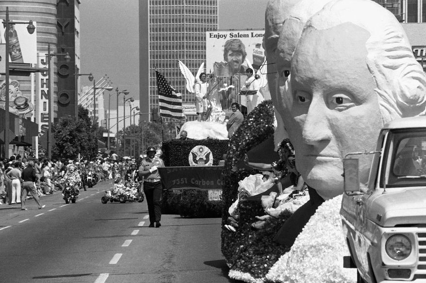 Floats and participants in the 10.8-mile All Nation, All People Official Los Angeles County Bicentennial Parade along Wilshire Boulevard in Los Angeles, Sunday, July 4, 1976. (AP Photo/File)