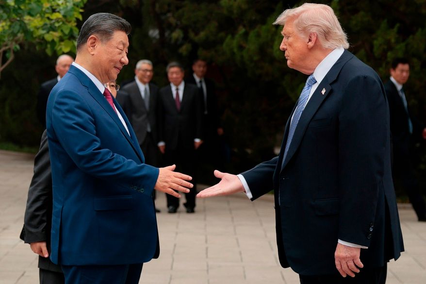 U.S. President Donald Trump, right, shakes hands with Chinese President Xi Jinping while leaving after a visit to the Zhongnanhai Garden in Beijing, Friday, May 15, 2026. (Evan Vucci/Pool Photo via AP, file)