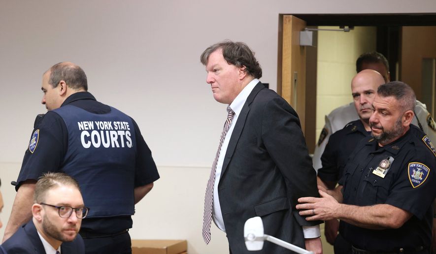 Alleged Gilgo serial killer Rex Heuermann is led into courtroom for a Frye hearing at Suffolk County Court in Riverhead, N.Y., April 3, 2025. (James Carbone/Newsday via AP, File)