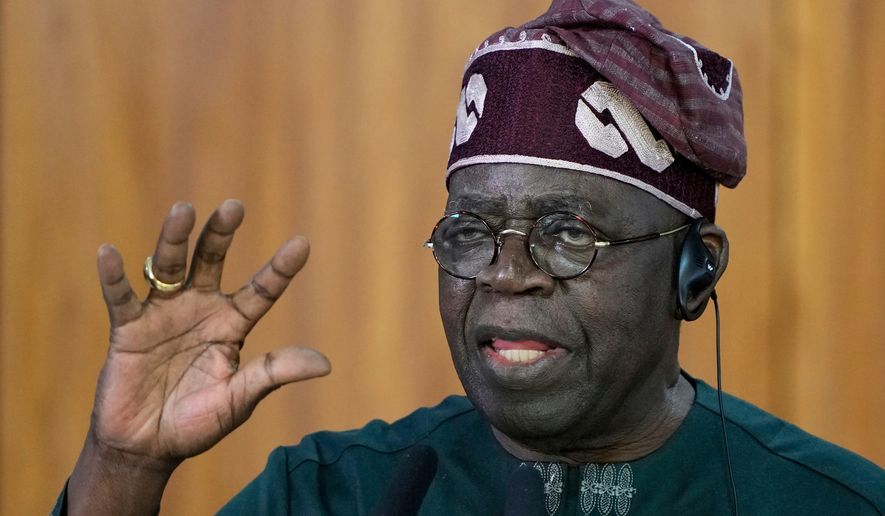 Nigeria's President Bola Tinubu gives a joint statement with Brazil's President Luiz Inacio Lula da Silva, at the Planalto presidential palace, in Brasilia, Brazil, Monday, Aug. 25, 2025. (AP Photo/Eraldo Peres, file)