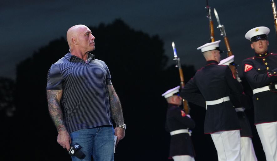 UFC commentator Joe Rogan during the ceremonial UFC Freedom 250 weigh-ins on the Ellipse, Saturday, June 13, 2026, in Washington, ahead of Sunday's fight on the South Lawn of the White House. (AP Photo/Julia Demaree Nikhinson)