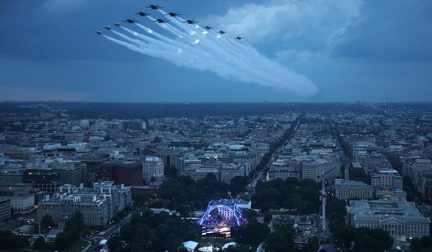 U.S. Air Force Thunderbirds and the U.S. Navy Blue Angels perform a flyover during the National Anthem at UFC Freedom 250 on the South Lawn of the White House on Sunday, June 14, 2026, in Washington. (Win McNamee/Pool Photo via AP)