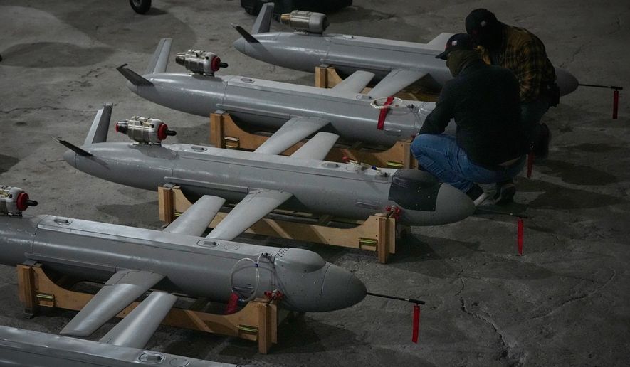 Servicemen of Ukraine's defense intelligence set up the Peklo (Hell) missile drones against Russian in an undisclosed location in Ukraine late Thursday, May 28, 2026. (AP Photo/Efrem Lukatsky)
